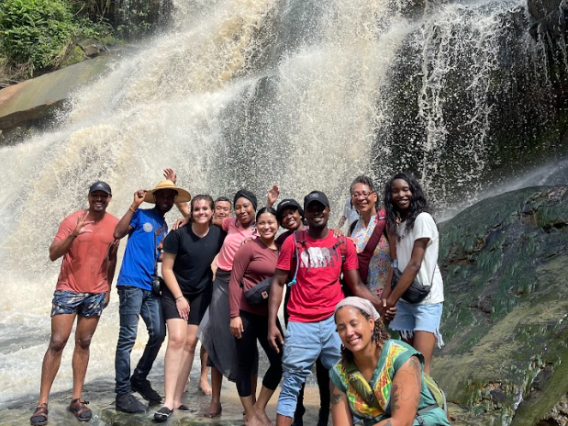 CIELO Students and Staff members on a trip to Ghana, visiting a waterfall