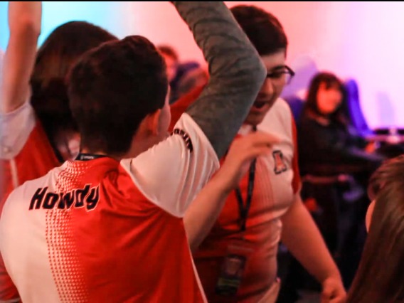 Students in Esports high fiving each other