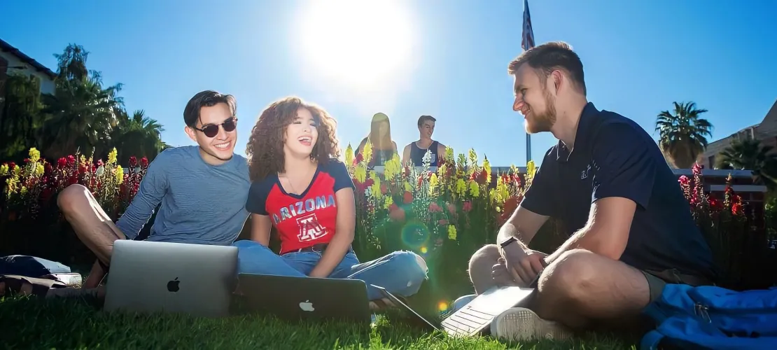 Students sitting on the Arizona Mall