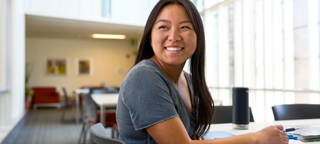 female student laughing