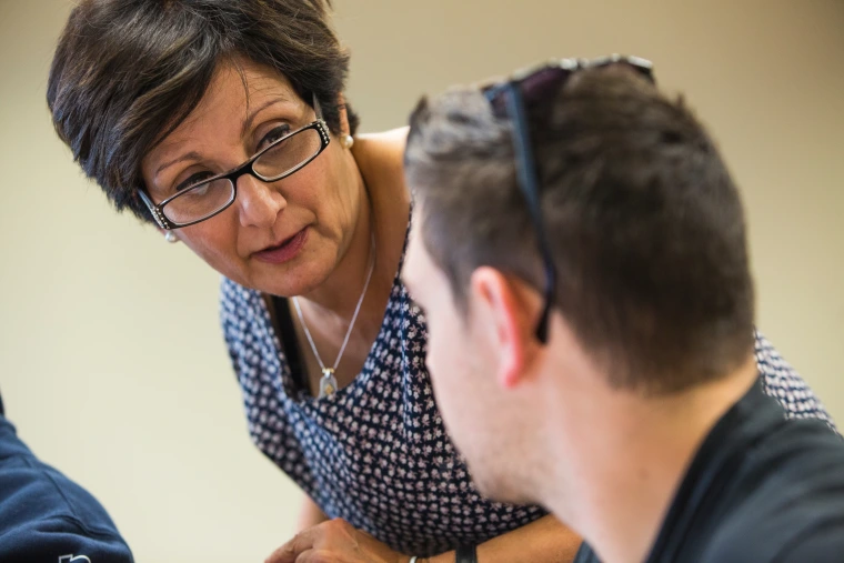 professor talking with a student